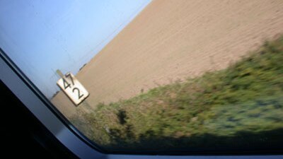 File photo: View from a train window (Flickr: Slurve)
