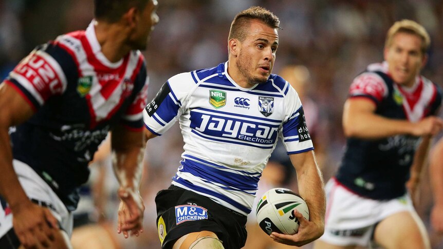 Contract extension ... Josh Reynolds (R) will stay with the Bulldogs until the end of the 2017 season.