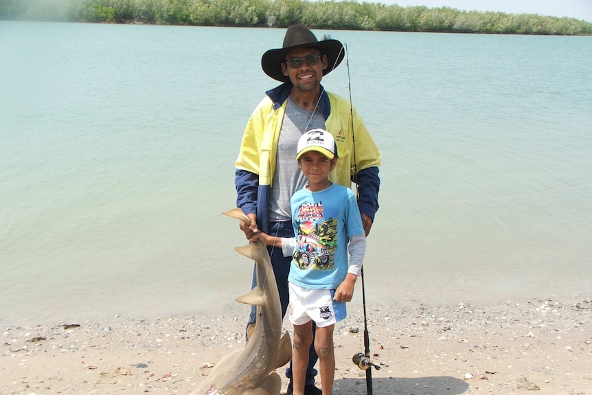 Peter Daley and his son Waylon fishing in the Gulf of Carpentaria.