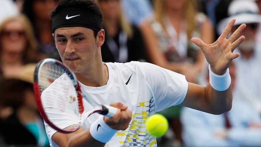 Tomic wins warm-up tournament in three sets