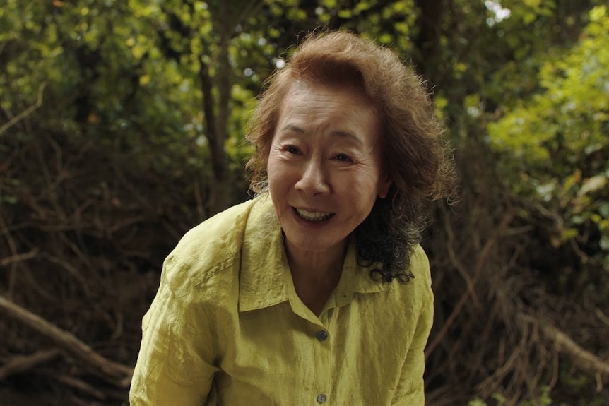 A still from the film Minari with a grandmother, played by Youn Yuh-jung