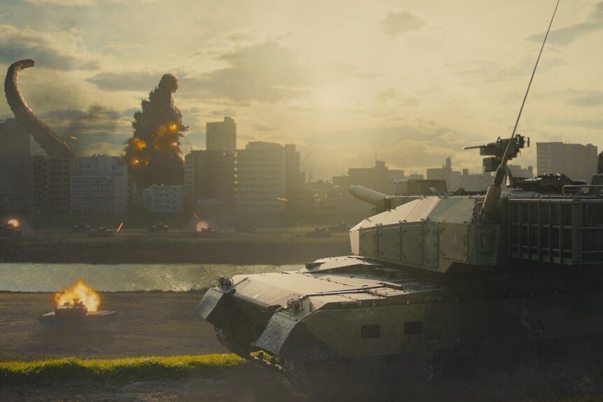 A tank aims at Godzilla in a scene from the 2016 film Shin Godzilla.