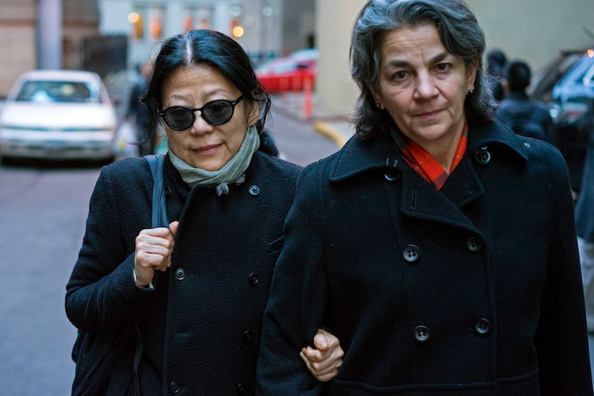 Sheri Yan leaves federal court in New York