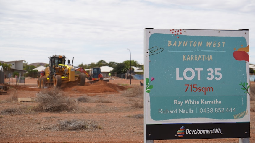 A sign displaying information about an empty plot of land in the Karratha suburb of Baynton West.