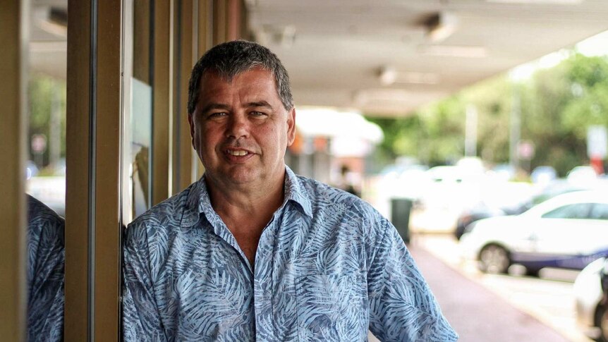Cambridge Gulf Ltd chief executive Tony Chafer leaning against a wall outside his office in Kununurra
