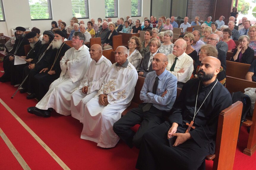 A huge crowd seated at the opening mass of the new Christian Coptic Orthodox Church.