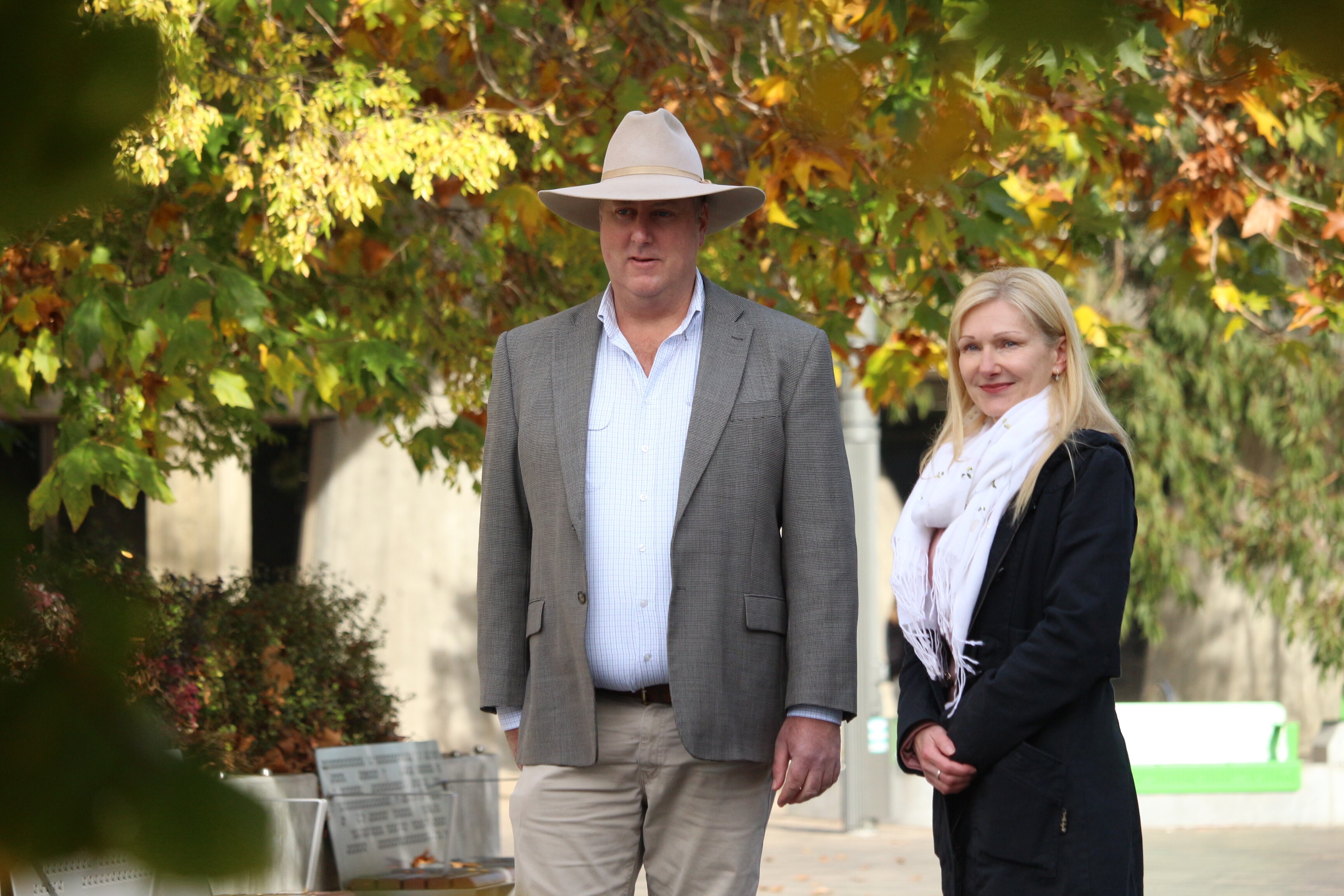 Lara Alexander and John Tucker pose for a photo.