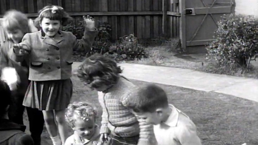 Old photo of children playing