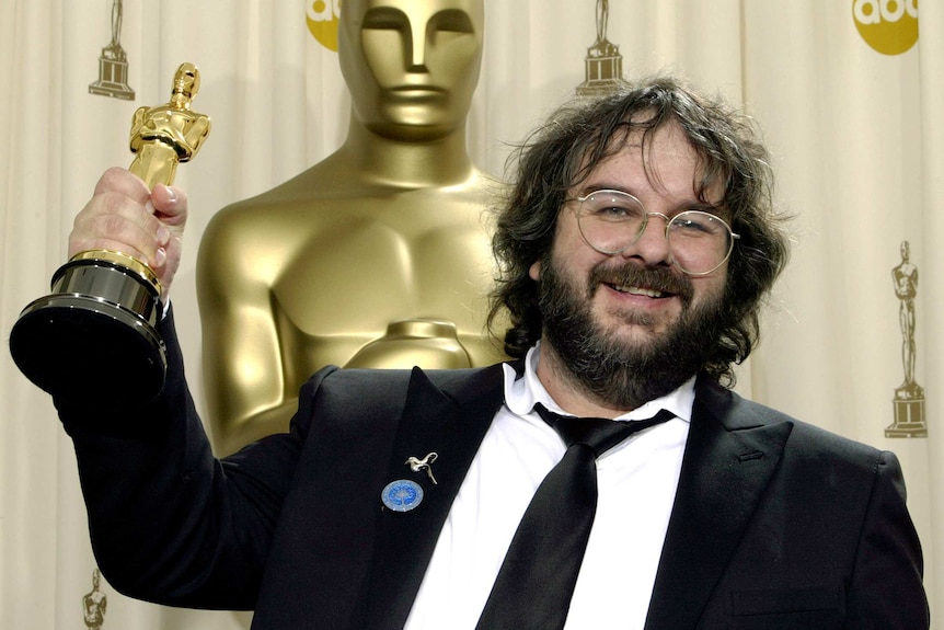 Lord Of The Rings director Peter Jackson with one of his many Oscars.