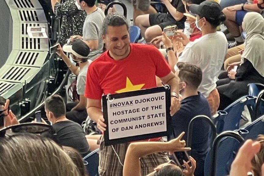 A man with a protest sign.