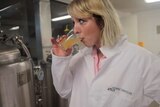 Adrienne Piersol tasting a craft beer at TAFE NSW