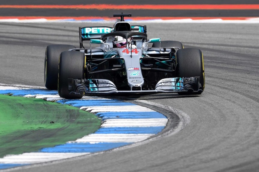 Lewis Hamilton goes round a corner in his Mercedes F1 car