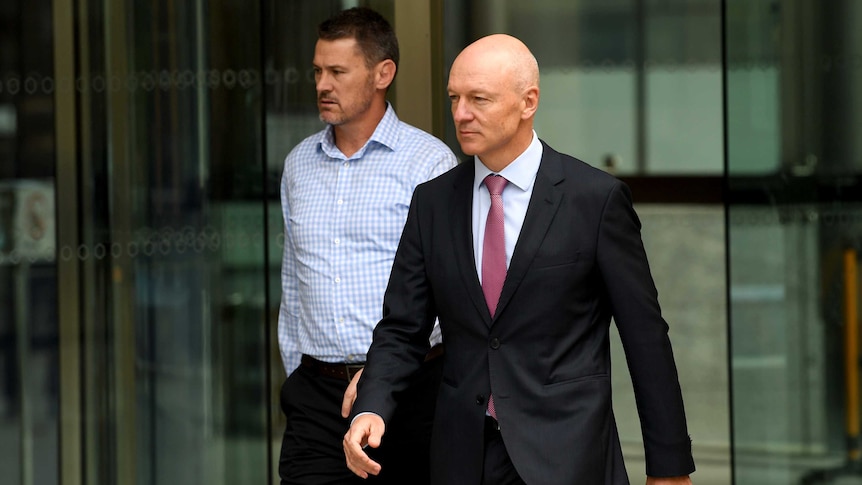 Commonwealth Bank executive Clive Van Horen leaves the royal commission.