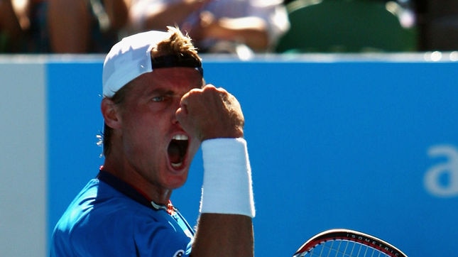 Pumped... Lleyton Hewitt fires up on his way to an easy first round win.