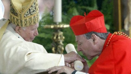 George Pell, pictured kissing the hand of Pope John Paul II on his appointment as a cardinal, says radical change is unlikely.