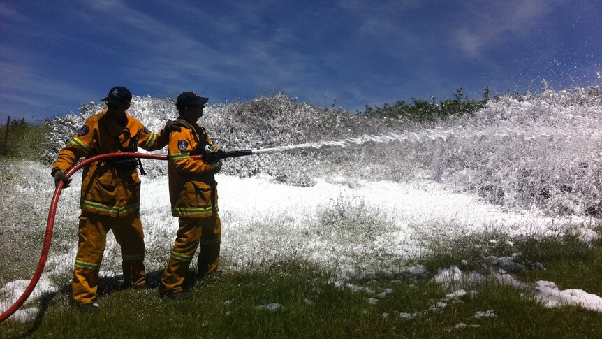 Tasmanian firefighters using the state's new 'compresses air foam' device