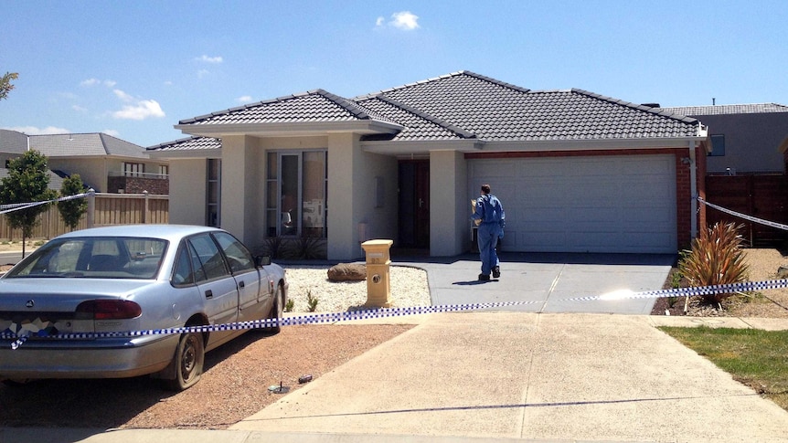 Forensic police at a house in Point Cook after the discovery of a body there.