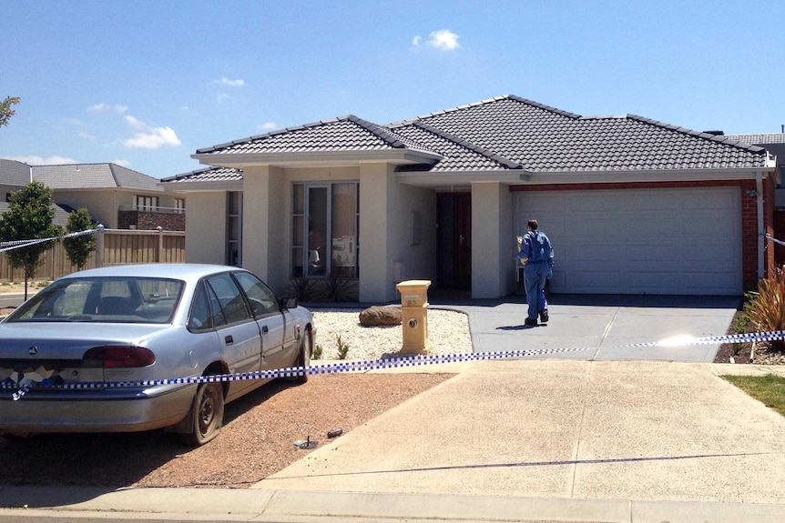 Forensic police at a house in Point Cook after the discovery of a body there.