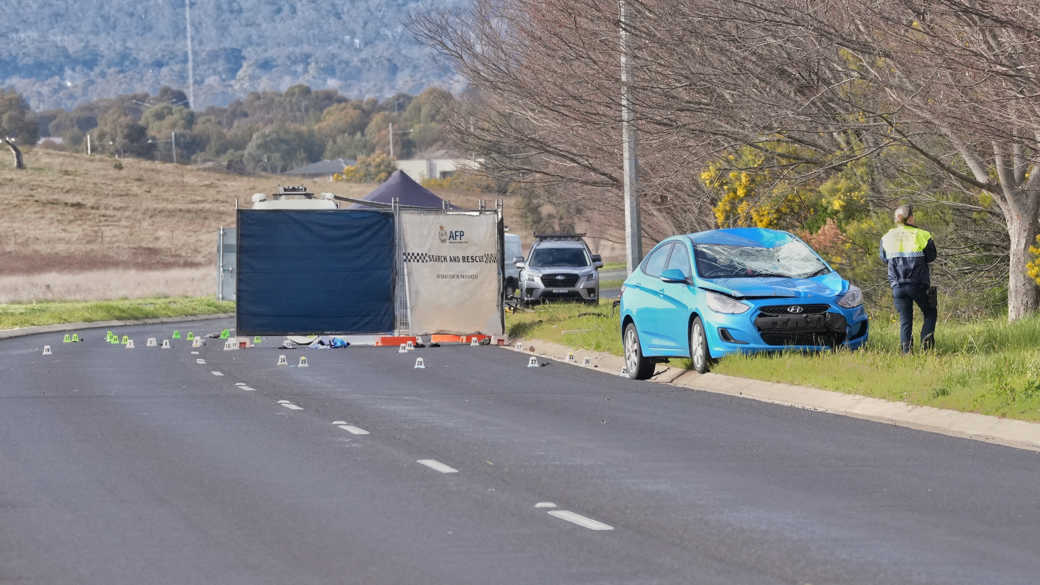 One dead, two injured after three cyclists hit in Canberra's north
