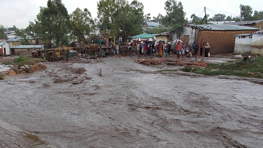 Floodwater rushes through township near Malawi capital Blantyre