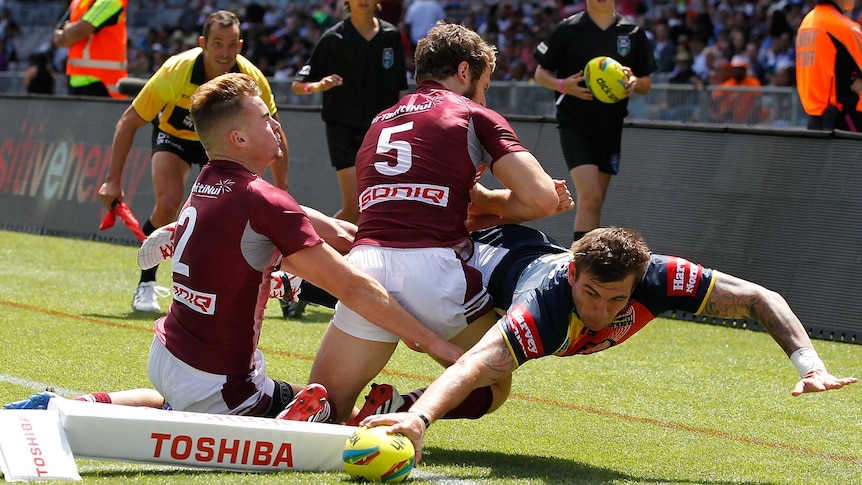 Kyle Feldt of the Cowboys scores during the NRL Nines