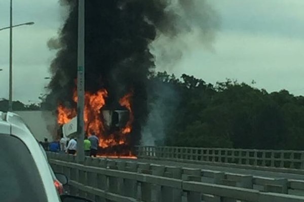 Truck on fire on M1