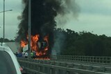 Truck on fire on M1