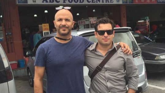 Four Corners reporter Linton Besser and cameraman Louie Eroglu in Malaysia.