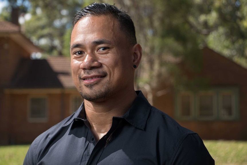 Uniting Church Reverend Fie Marino in black shirt.