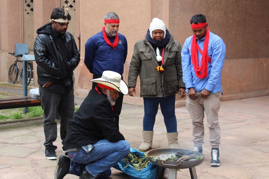 Conducting smoking ceremony in Leipzig