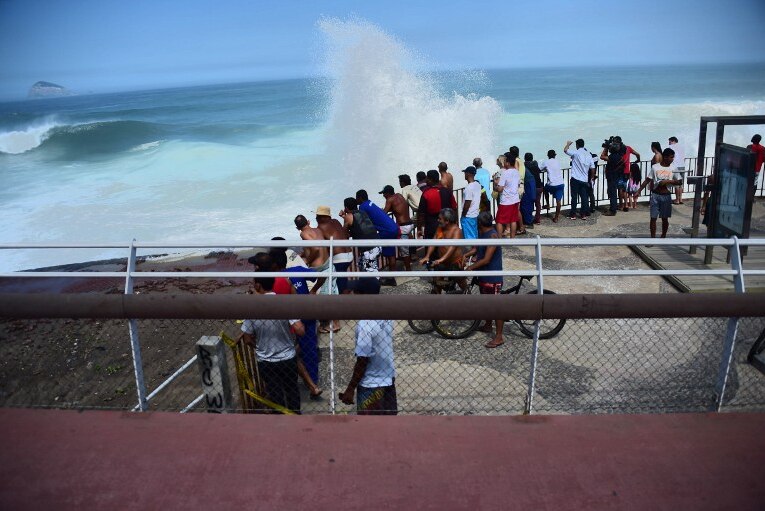 People remain in the site where a recently inaugurated bicycle track collapsed.