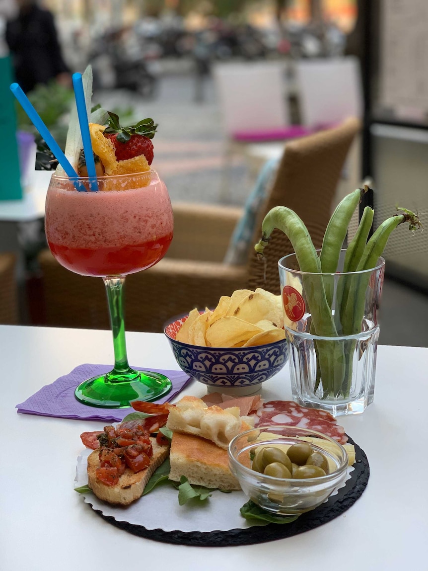Photo of mocktail and nibble food on a table that Flip Prior enjoyed on her Italian holiday
