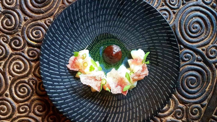 A beautiful plate of food featuring finger lime cells.