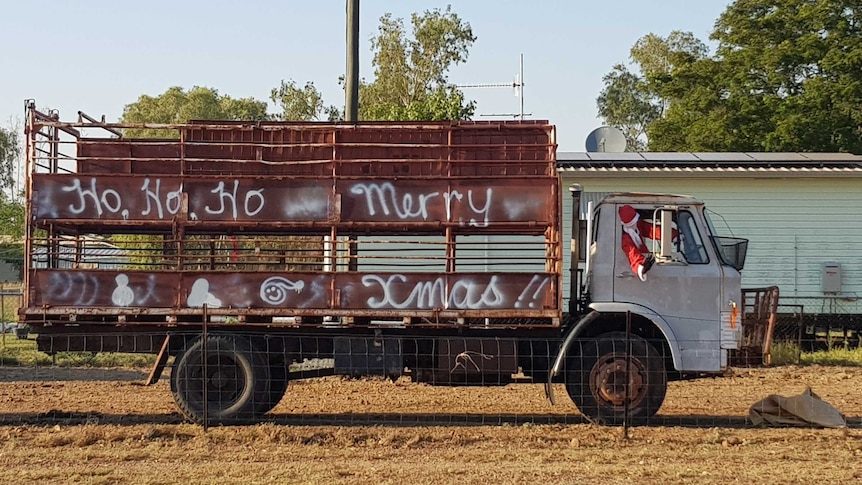 Santa driving a truck as part of a display contest in Isisford, Queensland