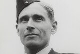 A black and white image of a RAAF pilot in uniform.