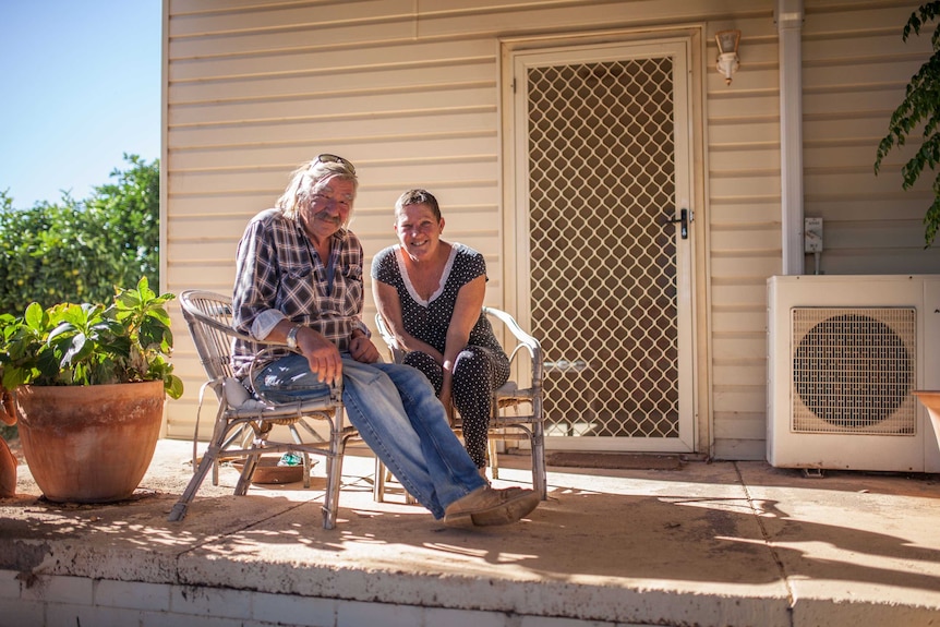 Williamstown, WA, residents Bob and Jan in front of their home.