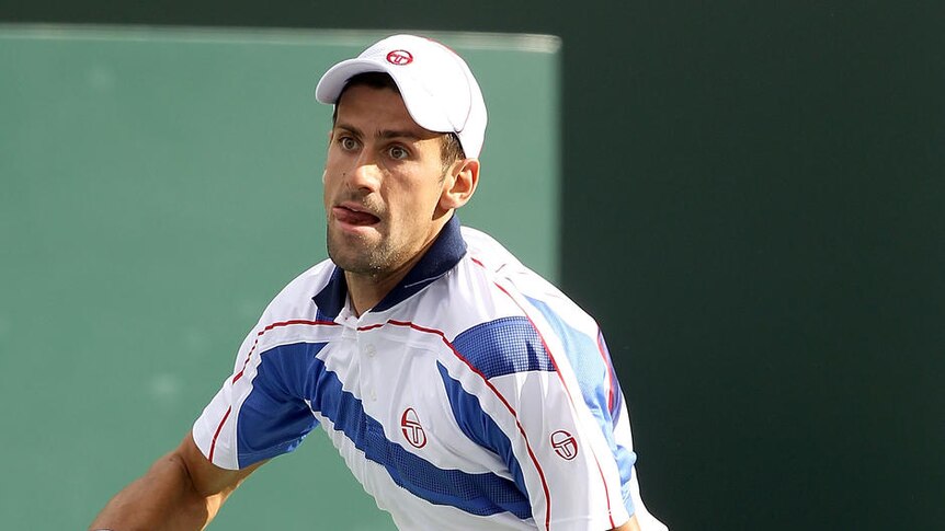 Novak Djokovic sprints for the ball at Indian Wells.
