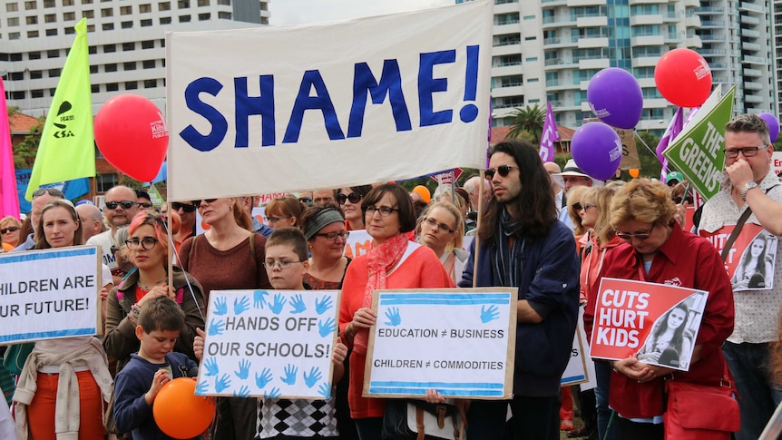 Children and parents joined teachers at a rally in Perth today protesting cuts to education spending. April 1, 2014.