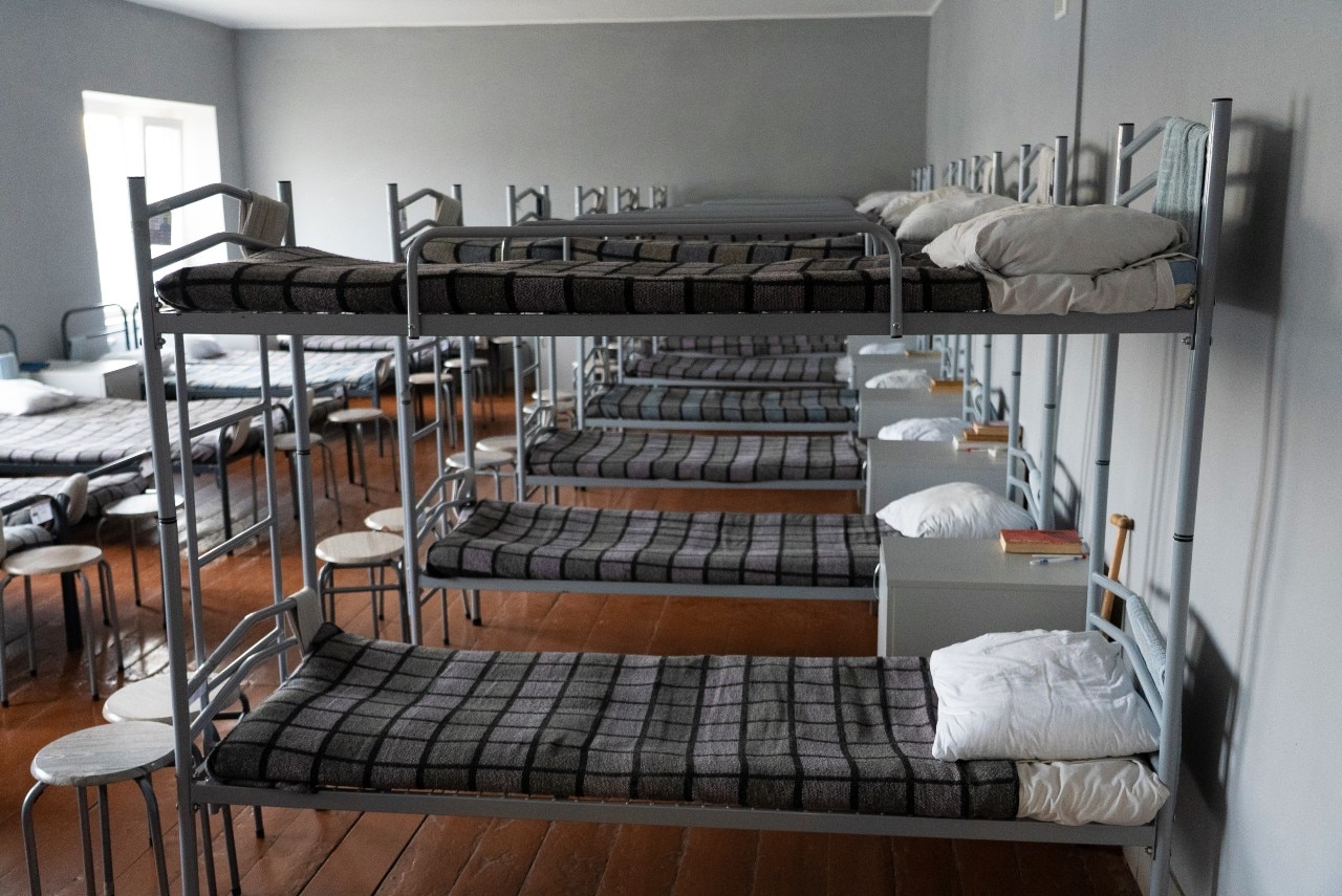 Several empty bunk beds.