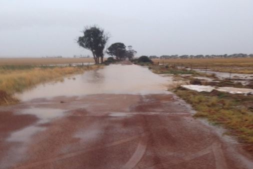 A flooded road in Wyalkatchem in WA's Wheatbelt after heavy falls