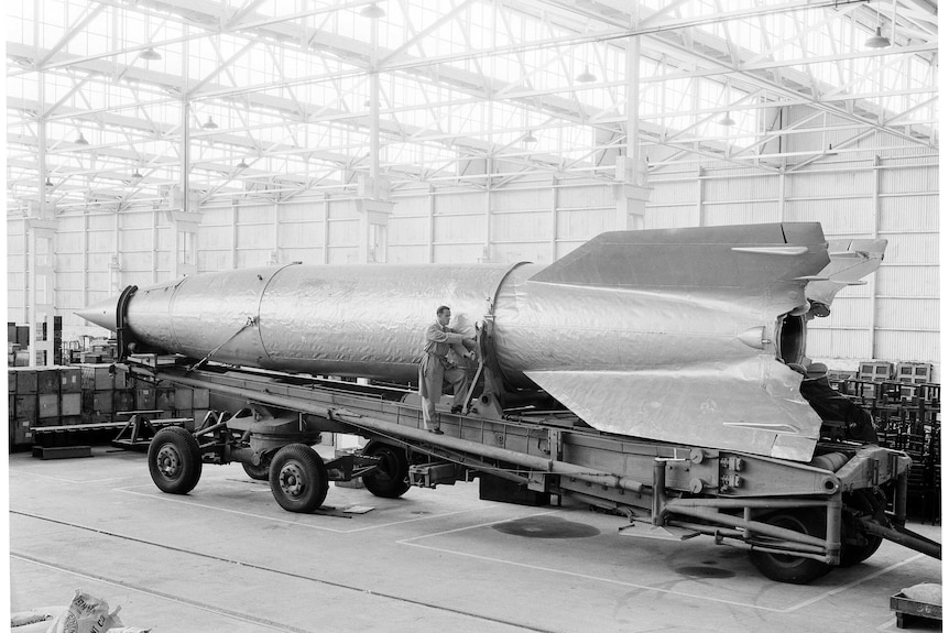 A captured German V-2 rocket in an Australian workshop.