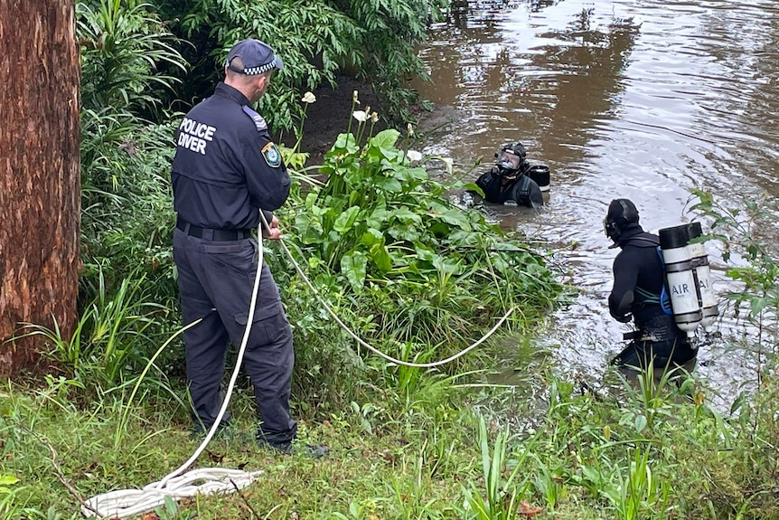 Police divers search water