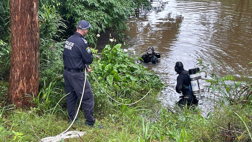 Police divers search water