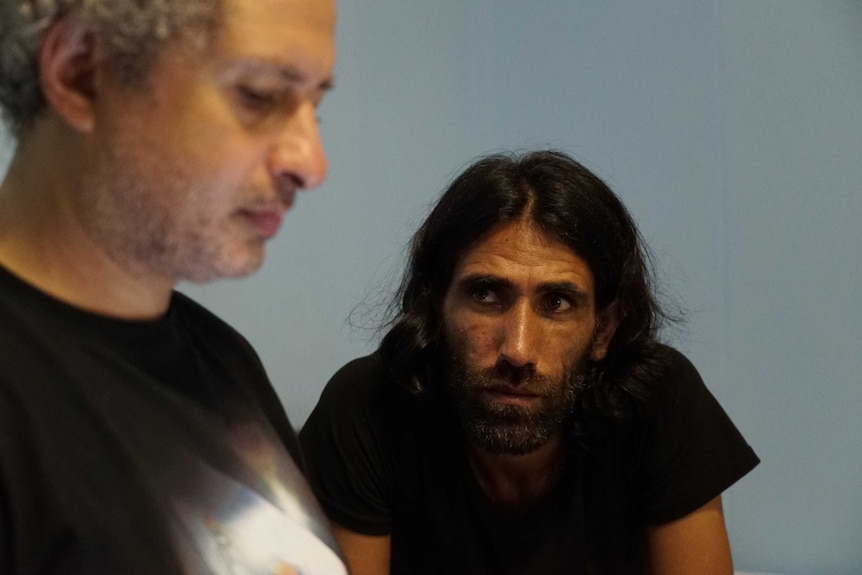 Behrouz Boochani and Omid Tofighian