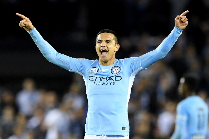 Tim Cahill of City celebrates after the side's win.
