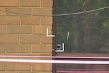 A bullet hole at the Gowrie house in Canberra, where several shots were fired.