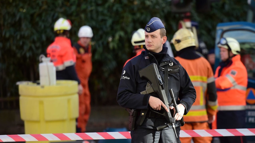 Policemen and firemen set a security cordon around Brussels' Great Mosque