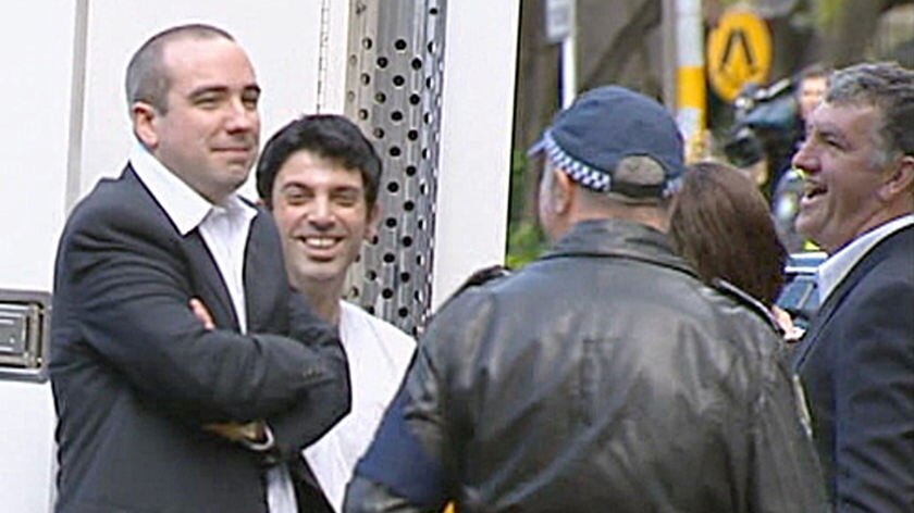 Chaser cast members Julian Morrow and Chas Licciardello are arrested by police in Sydney.
