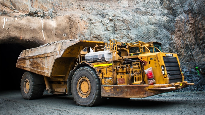 A truck emerges from underground mine.