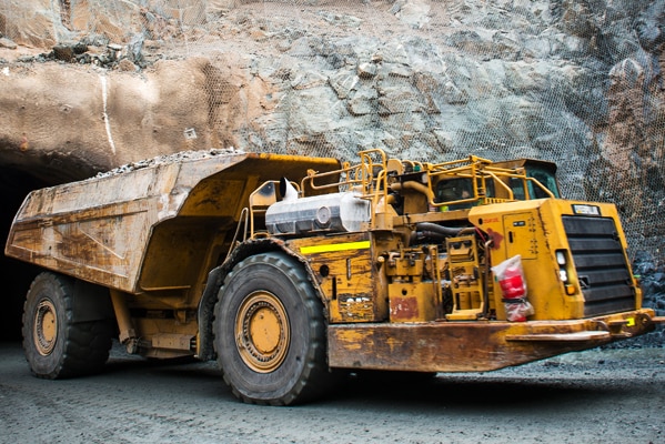 A truck emerges from underground mine.